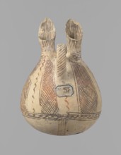Jug, unknown Cypriot workshop. White painted ware jug with a spherical bottom, a bulging