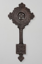Hand-made cross, Ethiopian workshop. The equal-armed cross is inscribed in a circular frame,