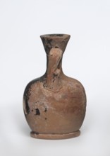 Lekythos with a sphinx, unknown Attic workshop. A small Attic red-figure lekythos with a vise. The