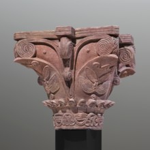 Upper and lower fragments of the capital reconstructed to their complete form. Nubian workshop.