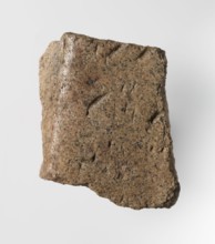 Inscription - fragment, unknown,  craftsman; granite fragment with engraved hieroglyphic