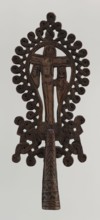 Processional cross, Ethiopian workshop. The pear-shaped frame depicts Christ on the cross with John