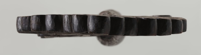 Processional cross, Ethiopian workshop. The pear-shaped frame depicts Christ on the cross with John