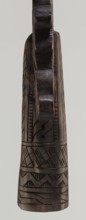 Processional cross, Ethiopian workshop. The pear-shaped frame depicts Christ on the cross with John