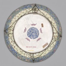 Platter, Large decorative platter with flat bottom and edges rising in an arc, set on a low, wide