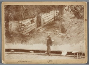 Painting the Raclawice Panorama: Jan Styka standing with a palette next to a part of the canvas