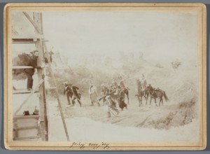 Painting the Raclawice Panorama: Teodor Axentowicz standing on scaffolding by a part of the canvas