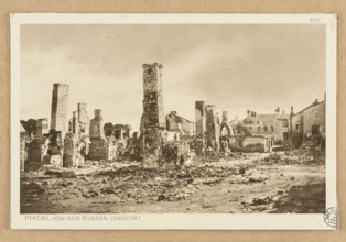 View of buildings destroyed by the Russians; postcard showing chimneys and war damage in a city