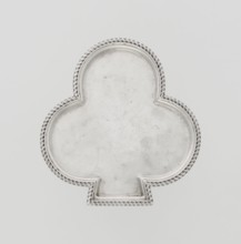 Tray, club-shaped with a smooth mirror surrounded by a raised half-cylinder edged with diagonal
