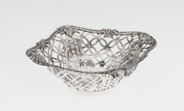 Openwork basket by Comyns & Sons goldsmiths’ firm, active 1859–1953. Four-sided openwork basket on