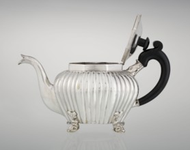 Teapot, maker Thomas II fl. 1798–1809?, goldsmith. Teapot supported on four legs in the form of