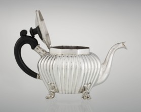 Teapot, maker Thomas II fl. 1798–1809?, goldsmith. Teapot supported on four legs in the form of