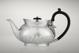 Teapot by Goldsmiths & Silversmiths Co Ltd London; makers William Gibson & John Langman goldsmiths.