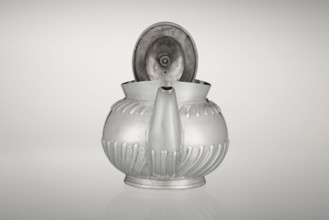 Teapot by Goldsmiths & Silversmiths Co Ltd London; makers William Gibson & John Langman goldsmiths.