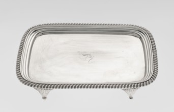 Tray on legs by William Bennet fl. 1796–1825, goldsmith. Tray on four legs in the form of stylised