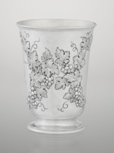Conical mug, silver on circular foot; belly decorated with relief vine wreaths, one with an English