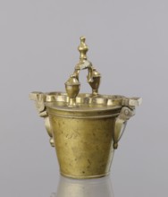 Seven weights in the form of bowls—truncated cones; the eighth largest serves as a container for