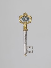 Souvenir key, steel, with a full shank and a simple feather in the form of two square brackets.
