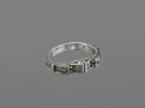 Bracelet, maker, scrap metal; 19th century, China/Mongolia; dragon with pearl motif;