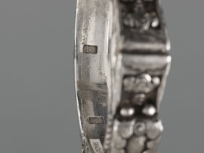 Bracelet, scrap metal, purchased; Chinese and Mongolian art influences; body/hand ornament, fashion