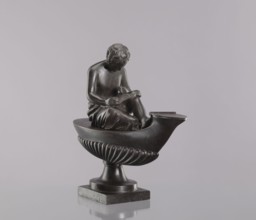 Decorative cast iron oil lamp, cast by Szewczykowski, Roman 1849–1901. 19th century, Poland. Square