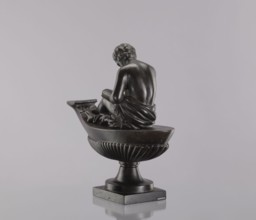 Decorative cast iron oil lamp, 19th century, Poland; square plinth with an oval boat-shaped