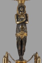 Two-candle candelabra depicting Egyptian women, early 19th century, France, lighting, height 35 cm,