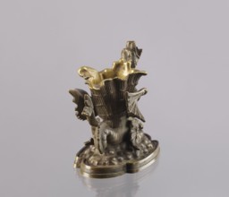 Spirit lamp, In the form of a two-winged dragon on a four-leaf oval base. Between the wings is a
