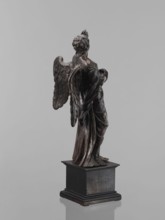 Statue - Angel, Renaissance, 16th century. Figure of a standing angel with his left hand raised,