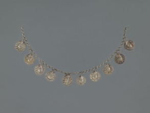 Bracelet, early 20th century, Middle East; Islamic art; shells; body ornament; female hand