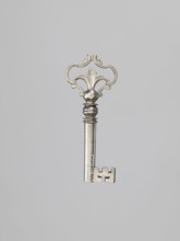 Furniture key, locksmithing; tubular handle with rectangular quill with cutouts. Ball-shaped node