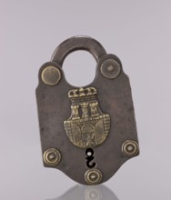 Padlock with the coat of arms of Kraków and brass rosettes, coats of arms, late 18th–early 19th