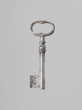 Iron key, locksmithing. Key with a tubular club-shaped shaft, with a feather widened at the end.