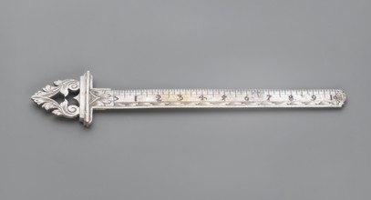 Ruler with a handle composed of interconnected acanthus twigs forming a triangle. Measuring