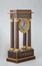 Mantel clock by Alexandre Pertrand fl. ca. 1840. Mantel clock in the form of a four-column portico
