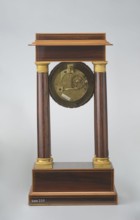 Mantel clock by Alexandre Pertrand fl. ca. 1840. Four-column portico form on a cuboid base and