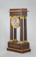 Mantel clock by Alexandre Pertrand fl. ca. 1840. Mantel clock in the form of a four-column portico