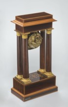 Mantel clock by Alexandre Pertrand fl. ca. 1840. Mantel clock in the form of a four-column portico