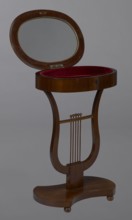 Oval display table with a lyre-shaped base mounted on a platform with a concave–convex outline,