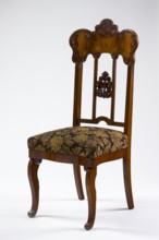 Chair, mahogany chair with a padded seat and a high openwork backrest, with carved decoration;