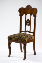 Chair, mahogany chair with a padded seat and a high openwork backrest, with carved decoration.