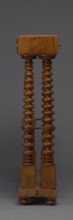 Pipe stand, origin unknown, smoking accessory featuring pipes and acorns; rack for pipes and