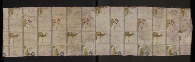 Fabric fragment: pale pink silk brocaded with colorful and silver threads. Brocade threads: light