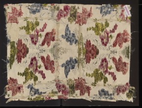 Fabric fragment, silk fabric fragment, patterned with fanciful floral sprigs entwined with silver