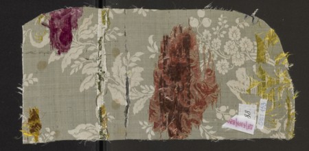 Fabric fragment, 18th-century silk fabric, France. White grosgrain background, pattern displayed