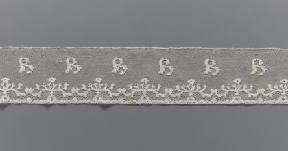 Lace fragment, plant ornaments, Louis XVI style, Malines Mechelen lace. At the lower edge there are
