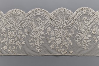 Lace fragment, bobbin lace, mid-19th century, Brussels. Plant ornaments; one ribbon is wider with