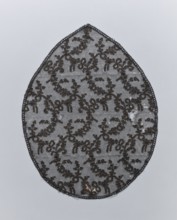 Lace, lace, plant ornaments, in the shape of an oval pointed on one side. A narrow strip of