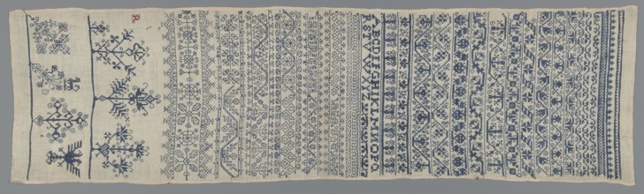 Embroidery sampler, Sampler with a cross-stitch pattern of trails, flower bushes, and letters. Blue