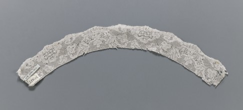 Lace fragment, mid-18th century, Binche lace, slightly rounded in shape; lower edge slightly
